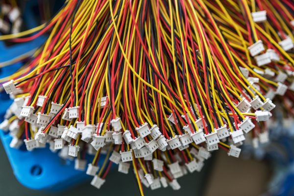 Close-up of a bundle of cut thin wires .The concept of electrical appliances in production and factory.